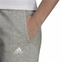 Långa träningsbyxor Adidas Essentials Fleece Logo Kvinna Grå