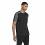 Herren Kurzarm-T-Shirt Adidas Essentials Melange Schwarz